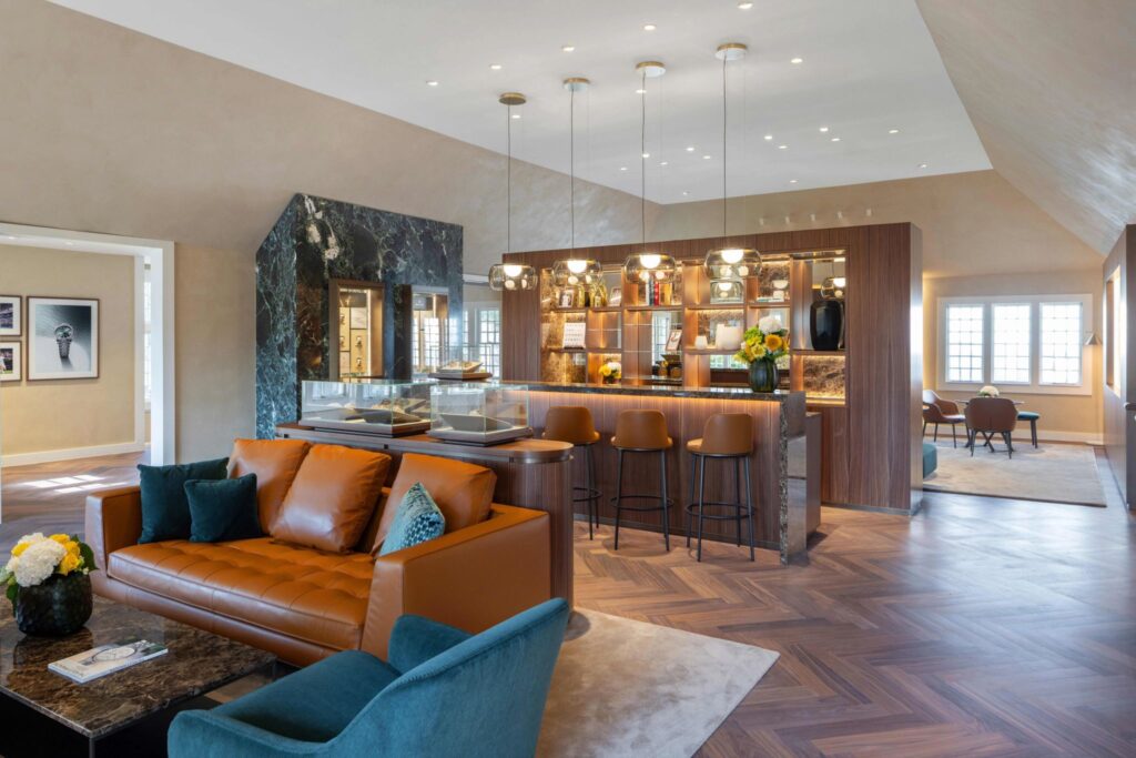 The garden of the Rolex boutique Hamptons, an image that captures the brand's concept of redefining the retail experience as private hospitality with its exclusive outdoor lounges.